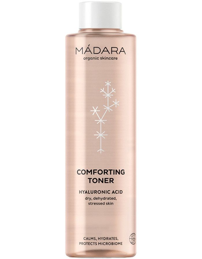 Mádara Comforting Toner kalmeert een gevoelige, droge en trekkerige huid met verzachtende bloemenwateren van korenbloemen en roos gecombineerd met kamille-extract.